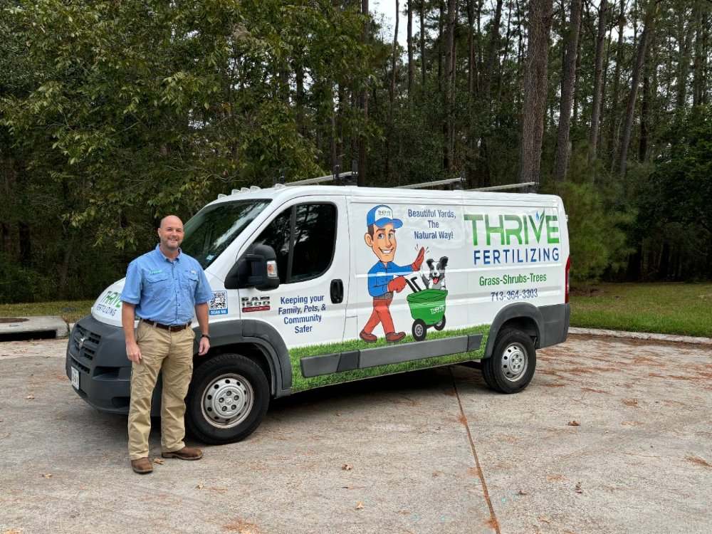 Jay, owner of Thrive Fertilizing Oak Forest & Houston location, with service van