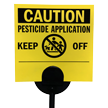 A pesticide-application caution sign — keep off